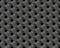 Seamless abstract background metallic honeycomb - hexagons with holes.