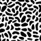 Seamless abstract pattern with black spots. Spotted background, fabric, textile, dalmatian print, cow pattern