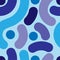 Seamless abstract pattern on blue background.Vector image. Graphic spotted colorful ornament.