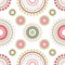 Seamless abstract pattern of circles and dots of green and red colors