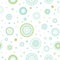 Seamless abstract pattern of circles and dots of green and turquoise colors