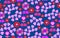 Seamless abstract pattern of hearts, pink twigs of hearts and original minimalists flowers on a blue background.
