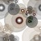 Seamless abstract pattern. Randomly scattered gray and brown transparent circles on a white background.