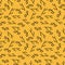 Seamless abstract pattern with symbols from ancient art in yellowish orange background