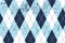 Seamless argyle aged pattern. Traditional diamond check print in moderate blue, soft blue and white with black stitch and grunge