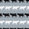 Seamless background of cows silhouettes