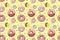 Seamless background with donut on yellow