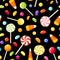 Seamless background with Halloween candies.