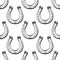 Seamless background pattern of horseshoes