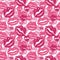 Seamless background with pink prints of lipstick