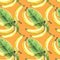 Seamless background of watercolor drawings of fruits yellow bananas and tropical banana green leaf