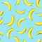 Seamless banana pattern on light blue background