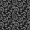 Seamless black and white pattern with paisley and flowers.