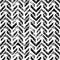 Seamless black and white pattern. Zigzag ornament drawn by brush on paper. Grunge simple ornament for textiles in bohemian style.