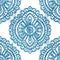 Seamless blue crosshatch tribal rug motif pattern.