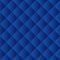 Seamless blue padded upholstery pattern background