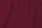 Seamless burgundy knit fabric. Close up.