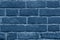 Seamless classic blue brick wall texture background. Pattern of weathered old cracked brickwall