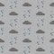 Seamless clouds and raindrops pattern vector illustration