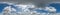 seamless cloudy blue skydome 360 hdri panorama view with flock of birds in awesome clouds with zenith for use in 3d graphics or