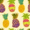 Seamless colorful pattern with hand drawn ananases.