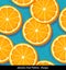 Seamless colorful pattern of sliced oranges