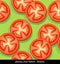 Seamless colorful pattern of sliced tomatoes