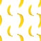 Seamless continuous yellow banana pattern design, isolated on white background