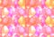 Seamless cute pattern with multicolored pink crystals with highlights.