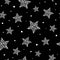 Seamless cute pattern with white stars made of dots and circles on black background. Vector illustration.