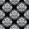 Seamless damask rich dark wallpaper