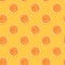 Seamless diagonal pattern of handmade dried orange slices on trendy yellow background