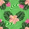 Seamless exotic pattern with tropical leaves and flowers on a white background. Hibiscus, palm