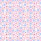 Seamless floral background with a pattern of different small flowers in pastel colors.