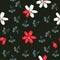 Seamless floral pattern with lilies and silhouettes of mini umbrella flowers isolated on black background in vector.