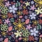 Seamless floral pattern with a lot of little flowers on black background.