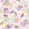 Seamless floral pattern with macaroons.