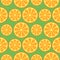 Seamless fruits vector pattern, bright close-up background with oranges over green backdrop