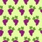Seamless fruits vector pattern, bright color background with grapes and leaves, over light green backdrop