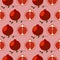 Seamless fruits vector pattern, bright color symmetrical background with pomegranates, whole and half, over red backdrop