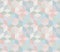 Seamless geometric patchwork pattern in pastel tones.