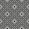 Seamless geometric pattern. Black and white retro ethnic design with rhombuses, squares, and crosses. Abstract background.
