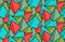 Seamless geometric pattern from multicolored pyramids. Childrens wallpaper from prisms. Fabric made of red and green cones