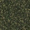 Seamless green camouflage pattern with small abstract shapes