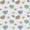 Seamless grey pattern with ornate hearts on ornamental background with arabian ornament