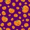 seamless halloween pattern with cartoon cute and funny pumpkins on purple background. halloween background with evil pumpkin. jack