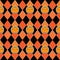 Seamless halloween pattern with pumpkins on argyle black and orange background.