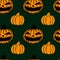Seamless halloween patttern with pumpkin, tile texture with Jacks Lanterns, design for wrapping paper, party decorations
