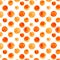 Seamless hand drawn watercolor pattern made of round orange dots, isolated over white.