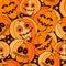 Seamless Happy Halloween pattern with scary orange pumpkins on dark background. Holiday background with creepy funny monster
